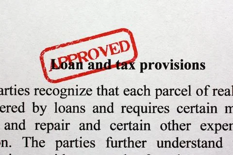 Approved Loan Document With Red Approved Stamp Over Loan And Tax Provisions Fotos de archivo