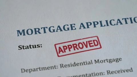 Approved Stamp Coming Down on Mortgage Application Form Stock Footage 341140752