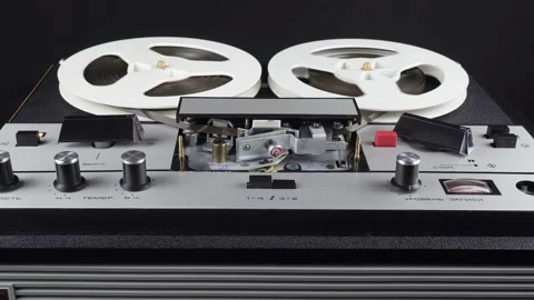 Approximation of an Old Reel Tape Recorder While Playing a Reel Tape. Stock Footage 231477221