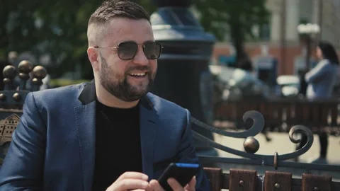 Appy handsome guy taking selfie on mobile phone in city. Stock Footage 172504071