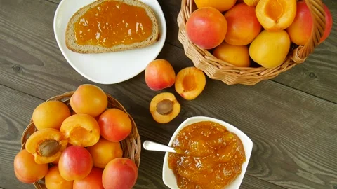 Apricot jam on the table. Stock Footage 297249999
