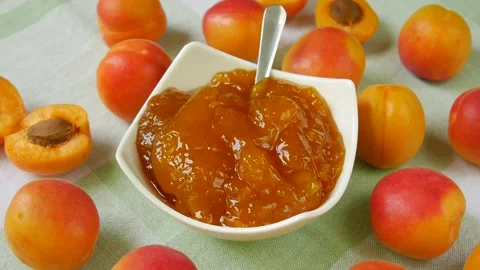 Apricot jam on the table. Stock Footage 297365013