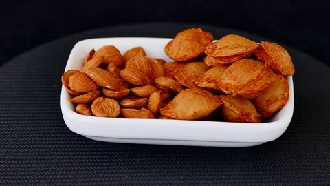 Apricot kernels in 360 degree rotating stand, Vídeo Stock 104621387