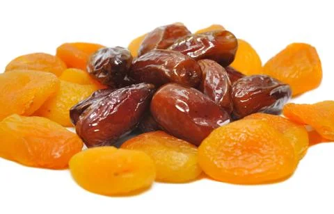 Apricots and dates Stock Photos