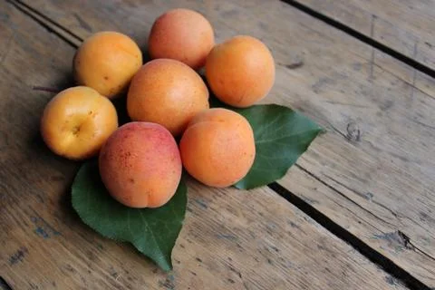 Apricots on the board Stock Photos