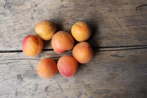 Apricots on the board Stock Photos