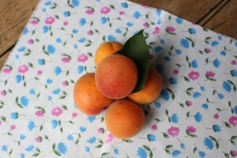 Apricots on the board Stock Photos