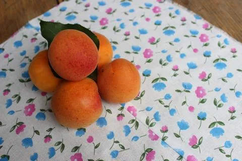 Apricots on the board Stock Photos
