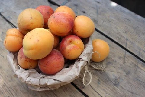 Apricots on the board Stock Photos