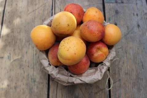 Apricots on the board Stock Photos