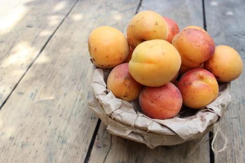 Apricots on the board Stock Photos