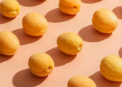 Apricots pattern on a beige background Foto stock
