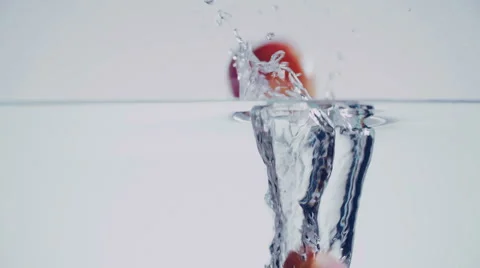 Apricots Splashing into Water Stock Footage 51456056