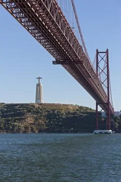 April 25th Bridge across River Tagus and Cristo Rei Statue, Lisbon,  Portugal Stock Photos
