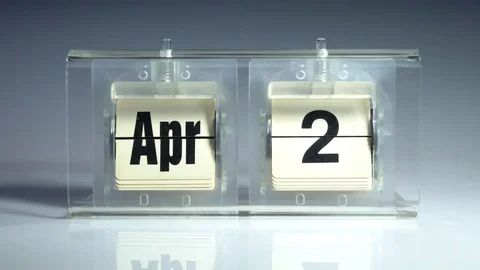 April. Mechanical tabletop flip calendar. Stock Footage 83275501
