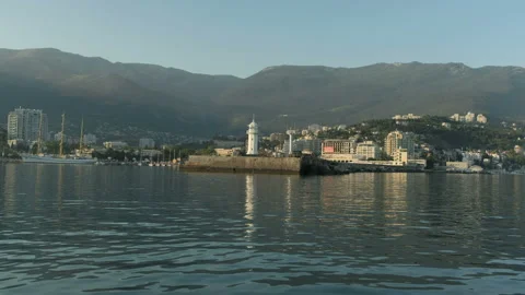 Aproaching lighthose at the beach. Stock Footage 96404231