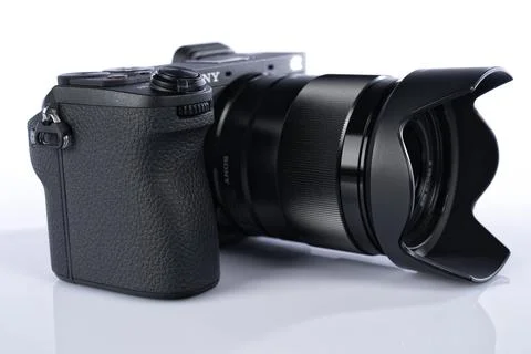 APS-C mirrorless Sony a6700 photo camera with the Sony FE 28 mm F2 lens att.. Stock Photos