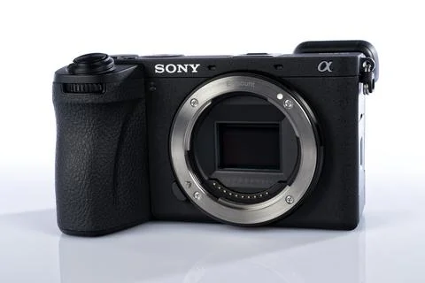 APS-C mirrorless Sony a6700 photo camera isolated on white Stock Photos