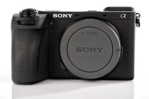 APS-C mirrorless Sony a6700 photo camera isolated on white Stock Photos