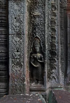 Apsara deva bas-relief on wall Ta Prohm temple Stock Photos