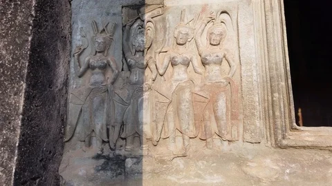 Apsara Divine Dancer Carved On Stone Wall in Angkor Wat  Stock Footage 105986841