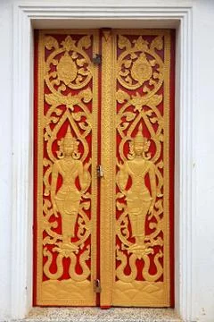 Apsaras in the door-laos Stock Photos