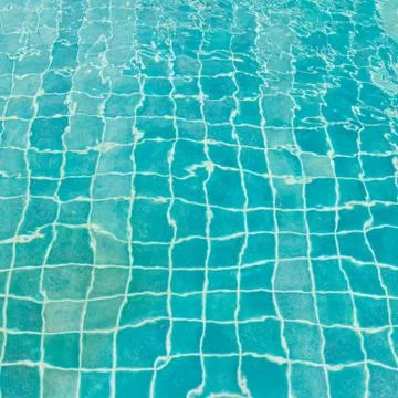 Aqua blue tile in pool Stock Photos