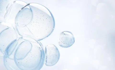 Aqua gel cream drops with bubbles floating on light blue 3d background. Liquid Stock Illustration