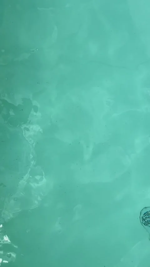 Aqua Water Texture: Tranquil Surface Ripples and Bubbles Depicting the Rela.. Stock Footage 316923174