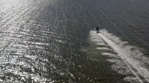 Aquabike riding. 4k Stock Footage 104635488