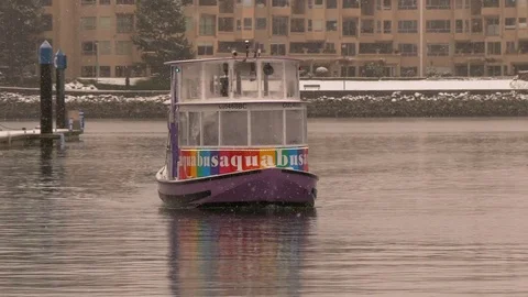 Aquabus moving under snow Stock Footage 72266103