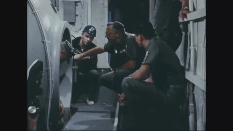 Aquanauts enter decompression chamber for unbuttoning procedure - 1968 Stock Footage 106046771