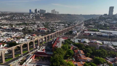 Aqueduct and morning commute in the growing business city of Queretero, Mexico Stock Footage 333782553
