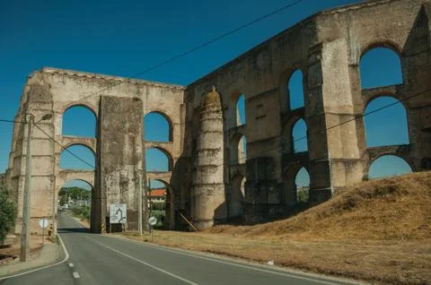 Aqueduct with arches and rectangular pillars on the road to Elvas Stock Photos