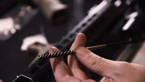 AR-15 complete disassembly and cleaning, bolt, barrel Video stock 246138131