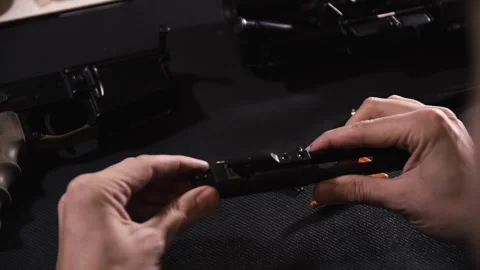 AR-15 complete disassembly and cleaning, bolt, barrel Video stock 246138390