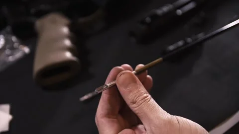 AR-15 complete disassembly and cleaning, bolt, barrel Video stock 246139125