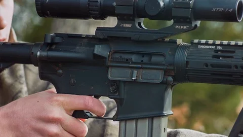 AR-15 Fire &amp; Ejecting Round Stock Footage 121269337