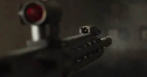 AR-15 rifle firing multiple shots down range in slow motion Stock Footage 229682302