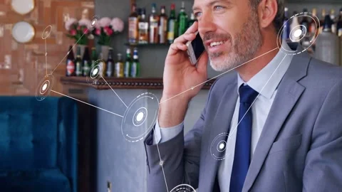 AR node appearing above cup growing network aligning head as biz exec speaking Stock Footage 333790437