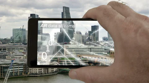 AR phone app showing streams of binary data flying round London. Stock Footage 67586533