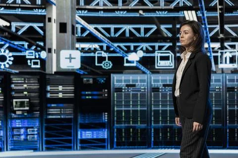 AR visualization of server farm supervised by manager doing maintenance Foto stock