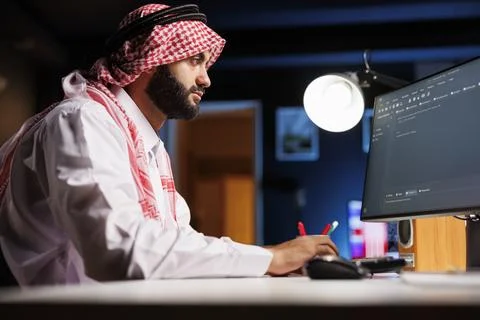 Arab App Developer Running Algorithms Stock Photos