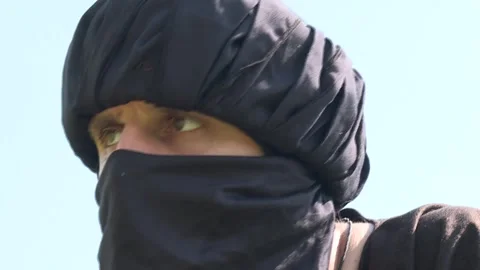 Arab assassin on the lookout. 2 Stock Footage 140598541