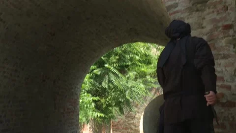Arab assassin sneaks 1 Stock Footage 140598571