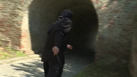 Arab assassin sneaks 2 Stock Footage 140598576