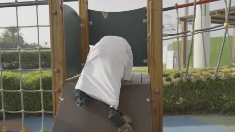 Arab boy playing in the park. Stock Footage 303637963