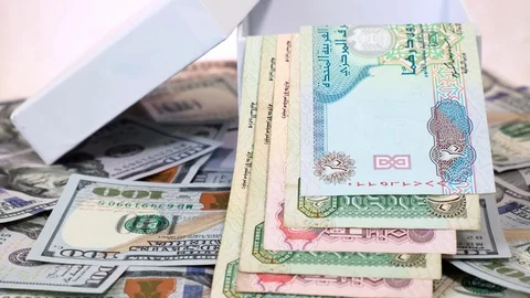 Arab Currency Dirhams in White Gift Box on a Background of American Dollars Stock Footage 129419587