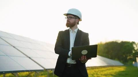 Arab engineer working with laptop in solar power plant Stock Footage 314408766
