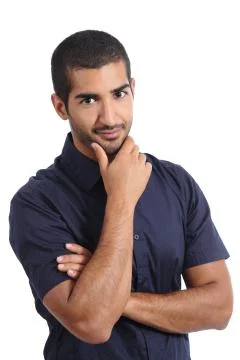 Arab handsome man posing while looking at camera Stock Photos